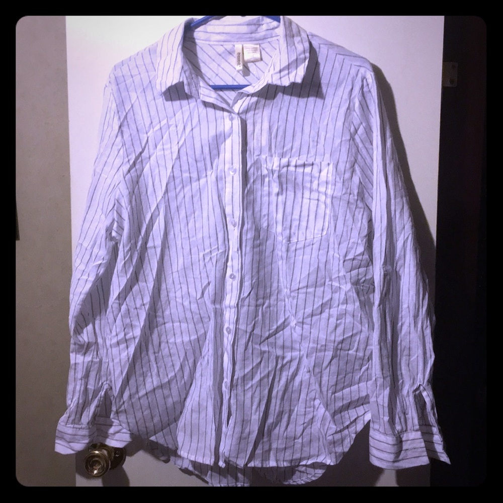 White and blue button down blouse.